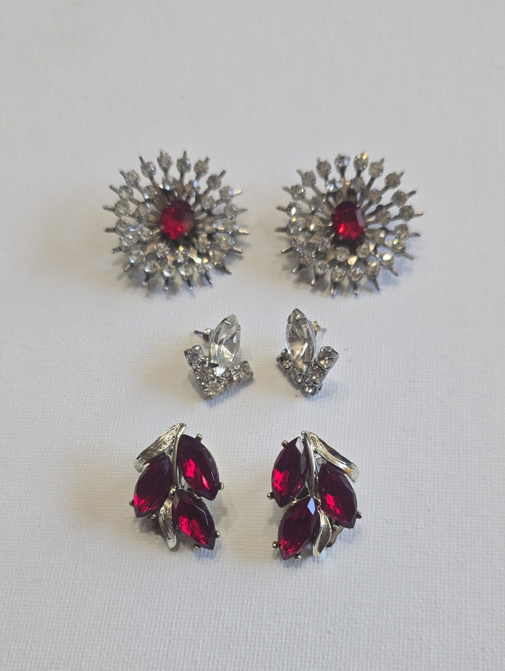 Three Pairs Of Vintage Silver and Red Crystal Clip On And Stud Earrings